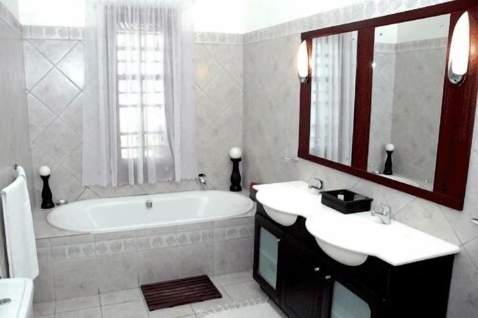 Imagen de la habitación del Hotel Kronenhoff Guest House. Foto 15
