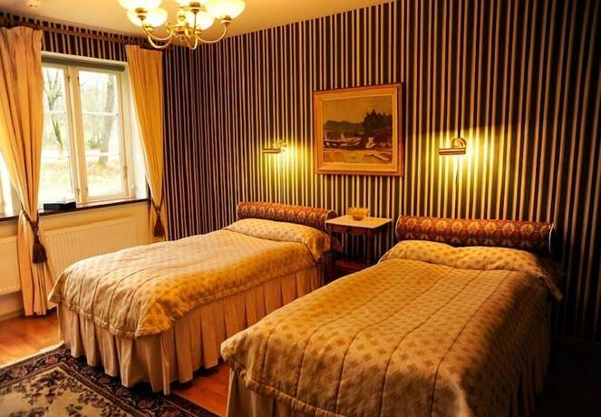Imagen de la habitación del Hotel Kronovalls vinslott. Foto 17