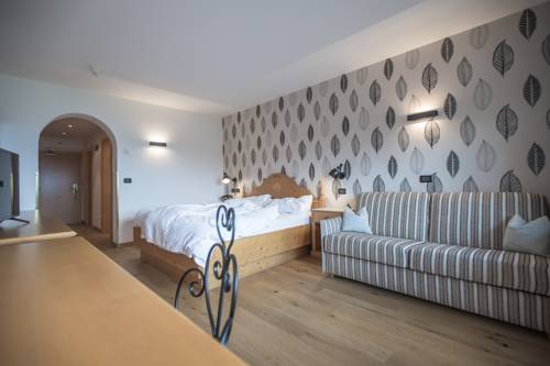 Imagen de la habitación del Hotel Kronplatz-resort Berghotel Zirm. Foto 5