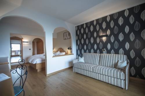 Imagen de la habitación del Hotel Kronplatz-resort Berghotel Zirm. Foto 7