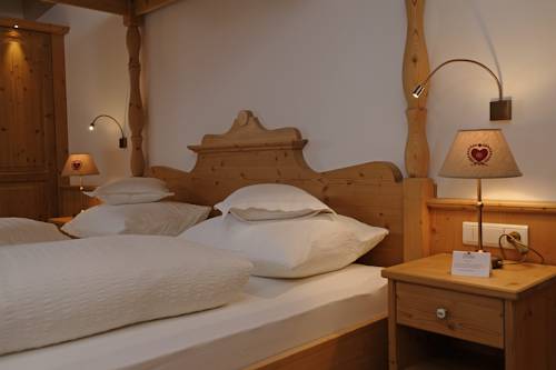 Imagen de la habitación del Hotel Kronplatz-resort Berghotel Zirm. Foto 9