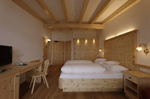 Imagen de la habitación del Hotel Kronplatz-resort Berghotel Zirm. Foto 10