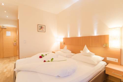 Imagen de la habitación del Hotel Kronplatz-resort Kristall. Foto 8