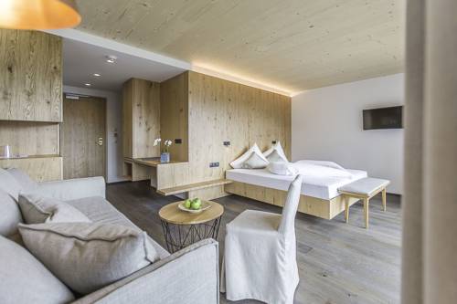 Imagen de la habitación del Hotel Kronplatz-resort Kristall. Foto 10