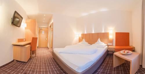 Imagen de la habitación del Hotel Kronplatz-resort Kristall. Foto 11