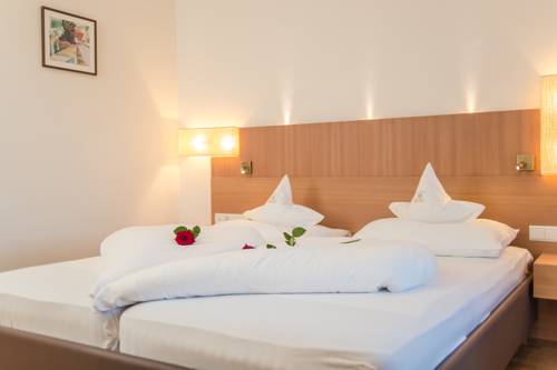 Imagen de la habitación del Hotel Kronplatz-resort Kristall. Foto 12