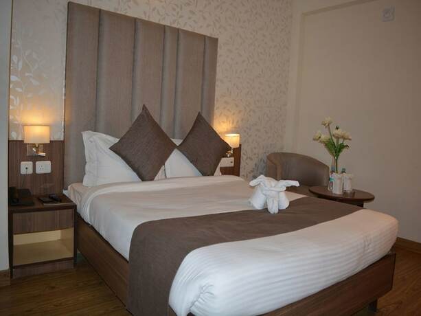 Imagen de la habitación del Hotel Krrish Clarks Inn. Foto 10