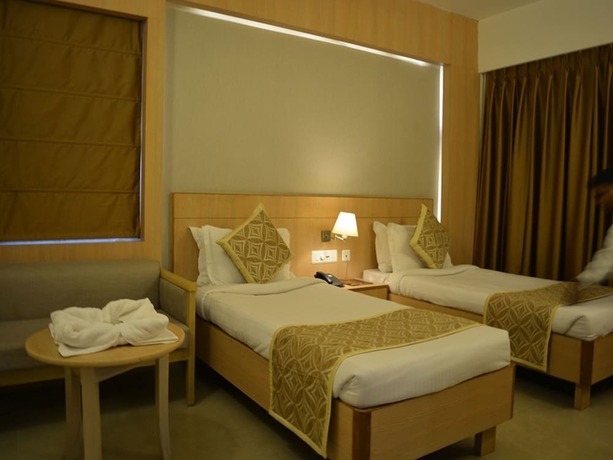 Imagen de la habitación del Hotel Krrish Clarks Inn. Foto 11