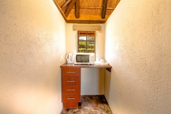 Imagen de la habitación del Hotel Kruger View Chalets. Foto 17