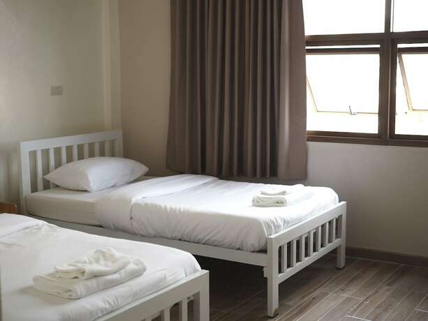 Imagen de la habitación del Hotel Krung Tone Hostel. Foto 10