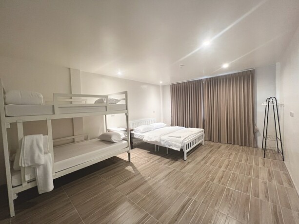 Imagen de la habitación del Hotel Krung Tone Hostel. Foto 16