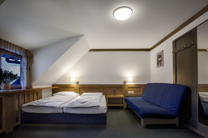 Imagen de la habitación del Hotel Krvavec. Foto 7
