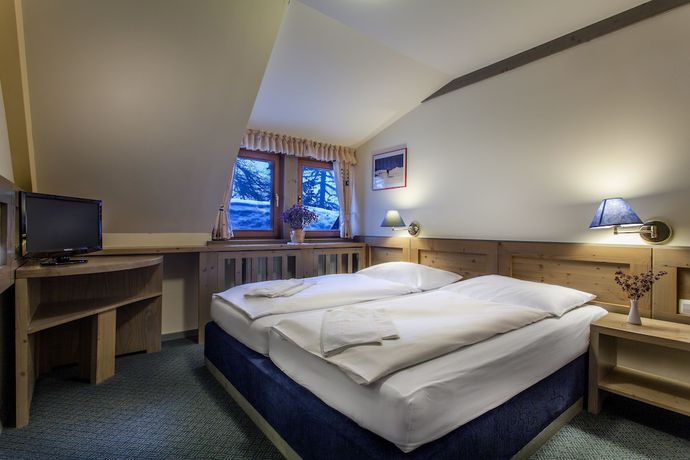 Imagen de la habitación del Hotel Krvavec. Foto 14