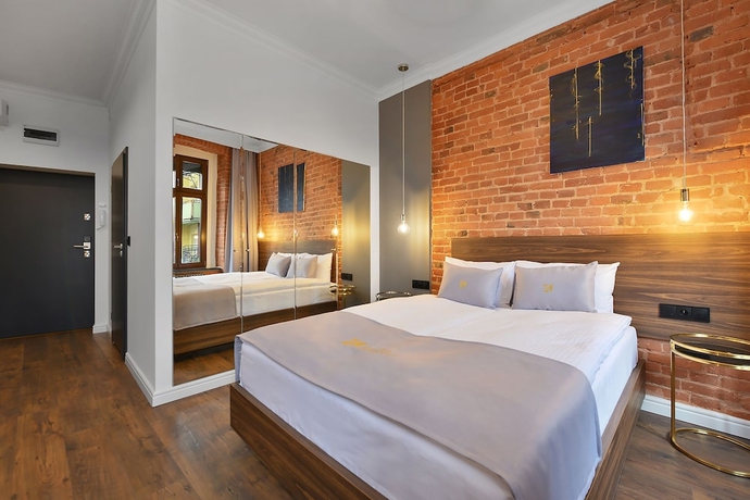 Imagen de la habitación del Hotel Krzywa Kamienica. Foto 11