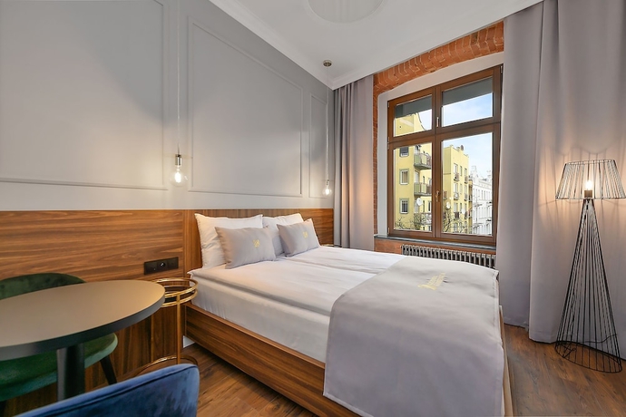 Imagen de la habitación del Hotel Krzywa Kamienica. Foto 12