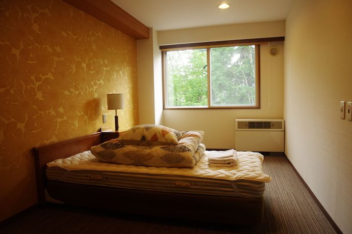 Imagen de la habitación del Hotel K\'s House Hokkaido - Asahidake Onsen Hostel. Foto 11