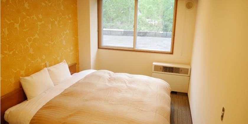 Imagen de la habitación del Hotel K\'s House Hokkaido - Asahidake Onsen Hostel. Foto 17