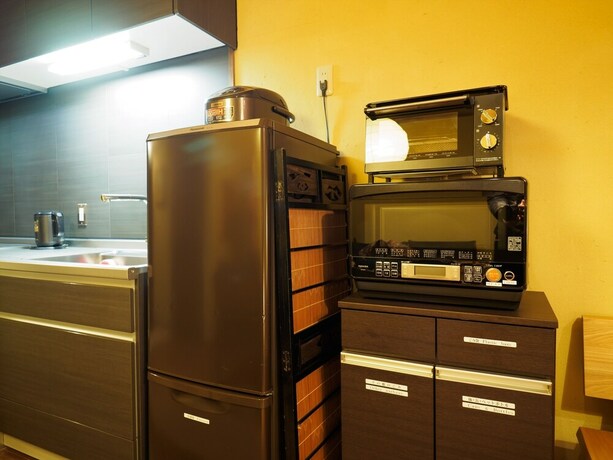 Imagen de la habitación del Hotel K's Villa Takasegawa-tei. Foto 25