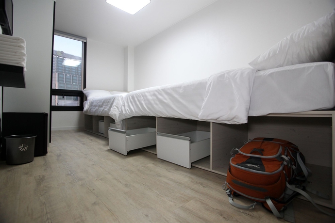 Imagen de la habitación del Hotel Kstar Metro. Foto 3