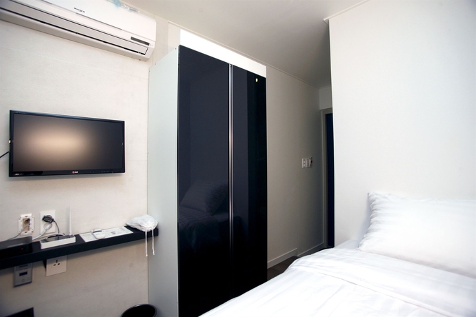 Imagen de la habitación del Hotel Kstar Metro. Foto 6