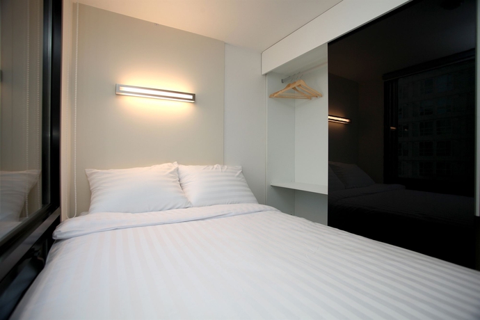 Imagen de la habitación del Hotel Kstar Metro. Foto 7