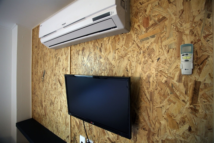 Imagen de la habitación del Hotel Kstar Metro. Foto 9