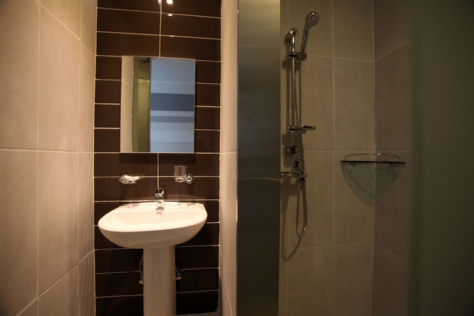 Imagen de la habitación del Hotel Kstar Metro. Foto 12