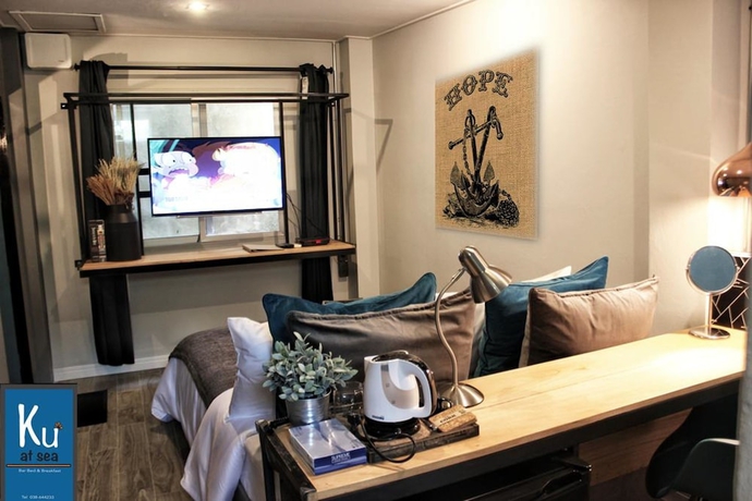Imagen de la habitación del Hotel Ku At Sea. Foto 13