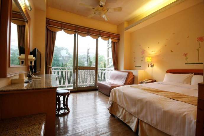 Imagen de la habitación del Hotel Ku Kuan Hotspring. Foto 8