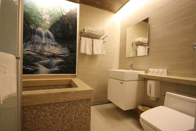 Imagen de la habitación del Hotel Ku Kuan Hotspring. Foto 13