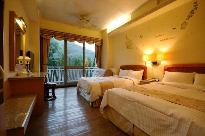 Imagen de la habitación del Hotel Ku Kuan Hotspring. Foto 16