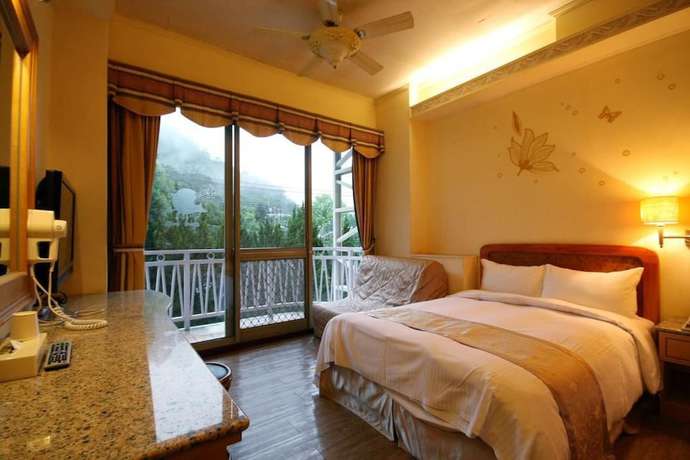 Imagen de la habitación del Hotel Ku Kuan Hotspring. Foto 18