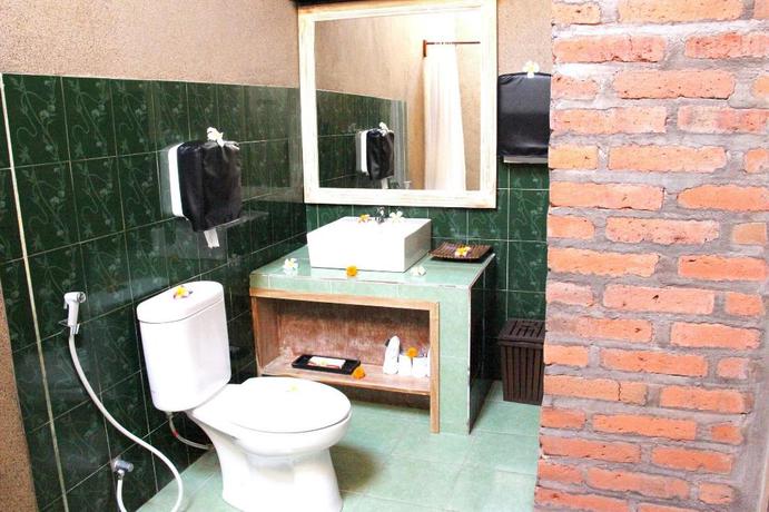 Imagen de la habitación del Hotel KuBuku. Foto 15