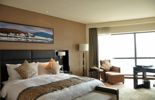 Imagen de la habitación del Hotel Kuang Yuan Jin Jiang Putian. Foto 6