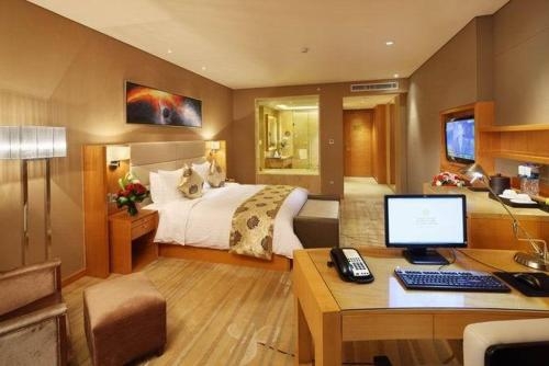 Imagen de la habitación del Hotel Kuang Yuan Jin Jiang Putian. Foto 9