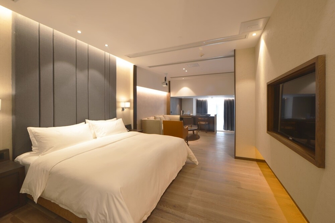 Imagen de la habitación del Hotel Kuanrong Luxury Suites - Daping Times Square. Foto 4