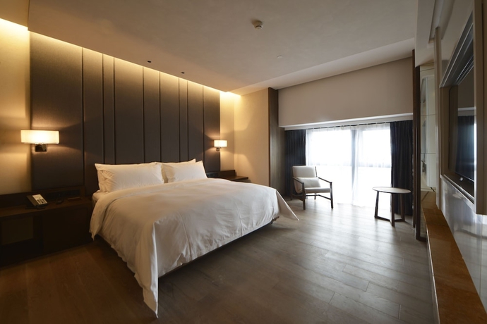 Imagen de la habitación del Hotel Kuanrong Luxury Suites - Daping Times Square. Foto 5