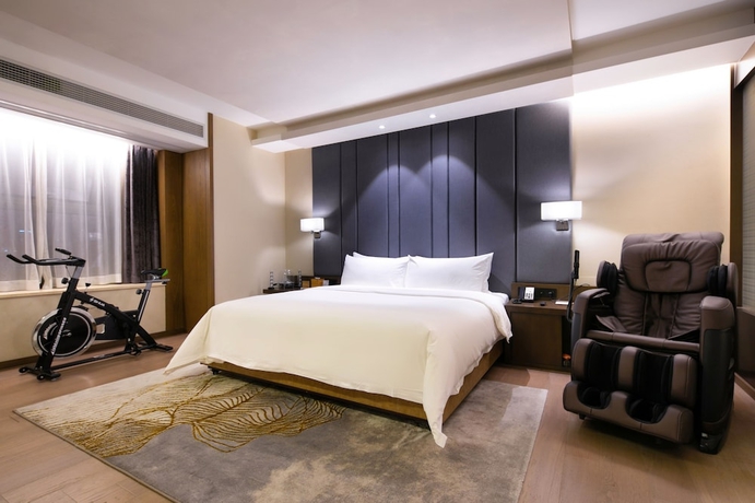 Imagen de la habitación del Hotel Kuanrong Luxury Suites - Daping Times Square. Foto 7