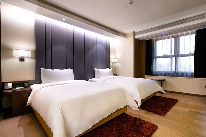 Imagen general del Hotel Kuanrong Luxury Suites - Daping Times Square. Foto 1