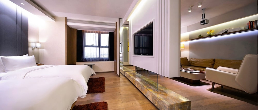 Imagen de la habitación del Hotel Kuanrong Luxury Suites - Daping Times Square. Foto 9
