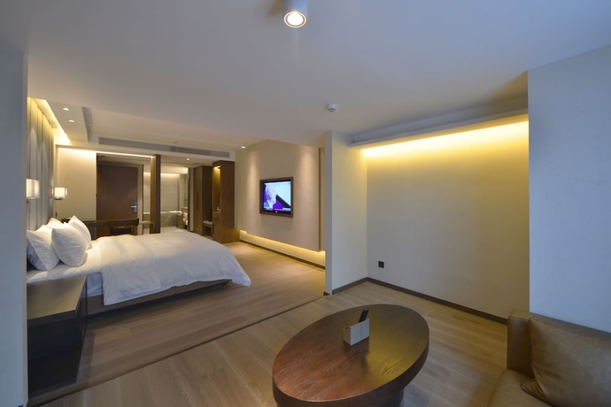 Imagen de la habitación del Hotel Kuanrong Luxury Suites - Daping Times Square. Foto 11