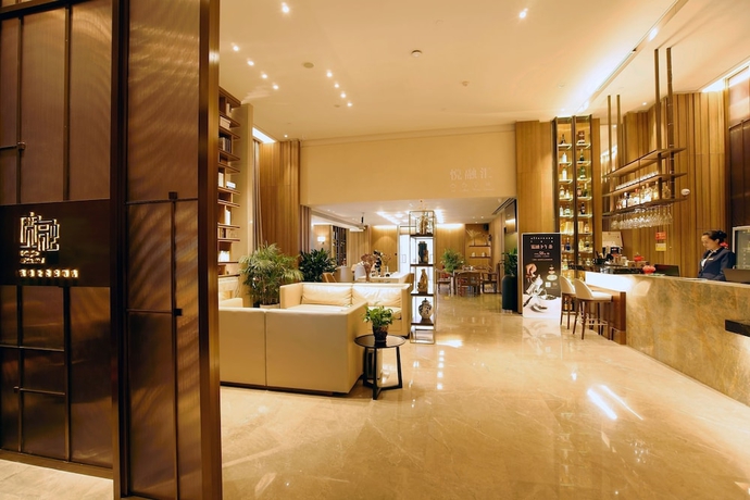 Imagen de los interiores del Hotel Kuanrong Luxury Suites - Daping Times Square. Foto 19