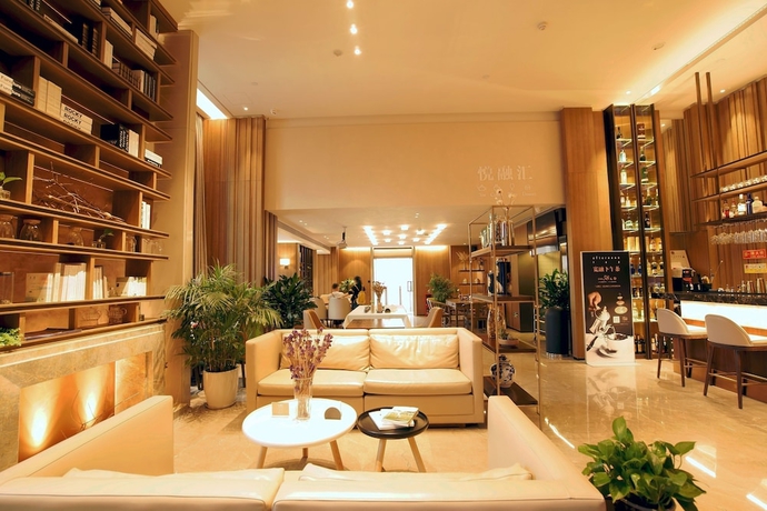 Imagen del bar/restaurante del Hotel Kuanrong Luxury Suites - Daping Times Square. Foto 2