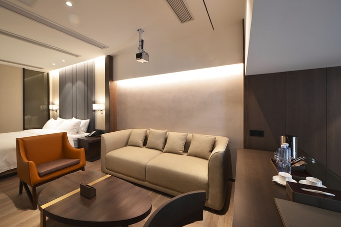 Imagen de la habitación del Hotel Kuanrong Luxury Suites - Daping Times Square. Foto 14
