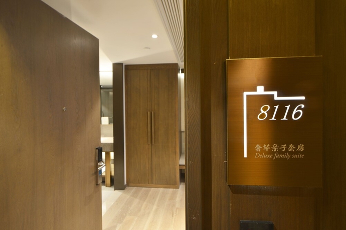 Imagen de la habitación del Hotel Kuanrong Luxury Suites - Daping Times Square. Foto 17