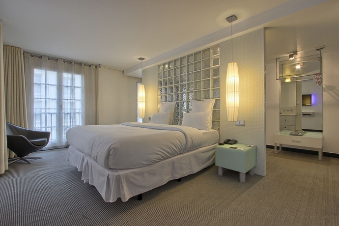 Imagen de la habitación del Hotel Kube Hotel Paris. Foto 5