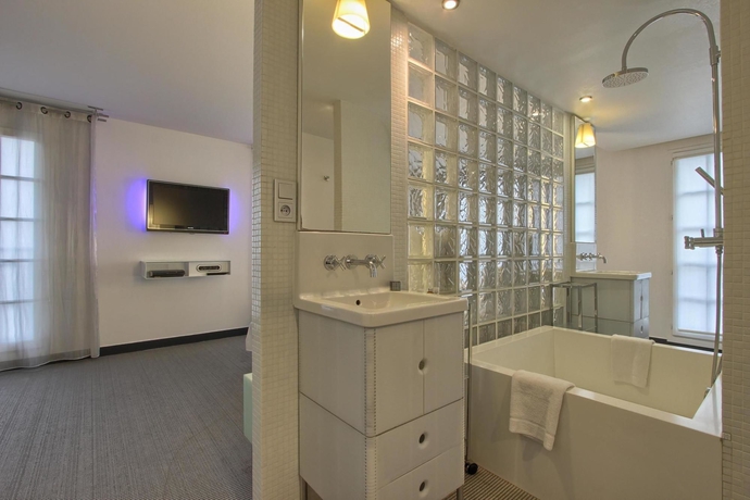 Imagen de la habitación del Hotel Kube Hotel Paris. Foto 7
