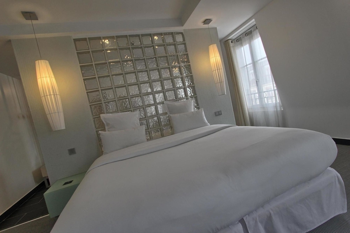 Imagen de la habitación del Hotel Kube Hotel Paris. Foto 8