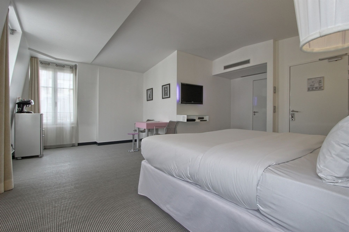 Imagen de la habitación del Hotel Kube Hotel Paris. Foto 15