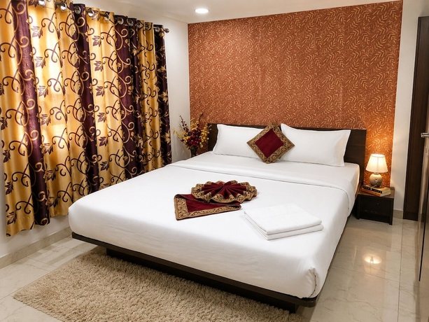 Imagen de la habitación del Hotel Kuber, Rajkot. Foto 2